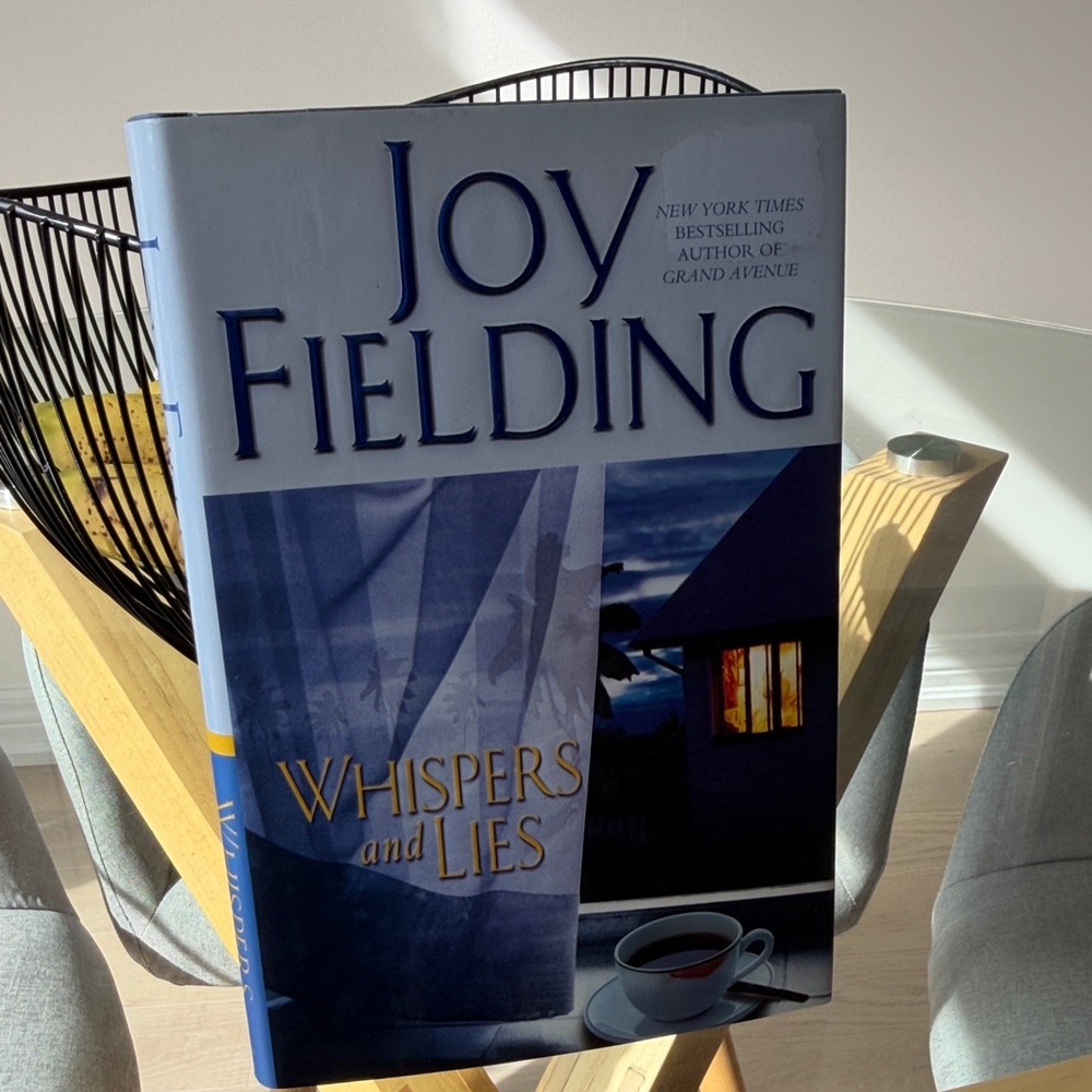 Joy Fielding "Whispers and Lies" Hardcover Book - Blue